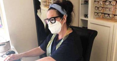 local-optician-allegro-optical-greenfield-sheryl-working-in-ppe-700x390